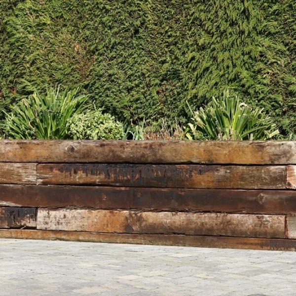 How to use sleepers to create a retaining wall 